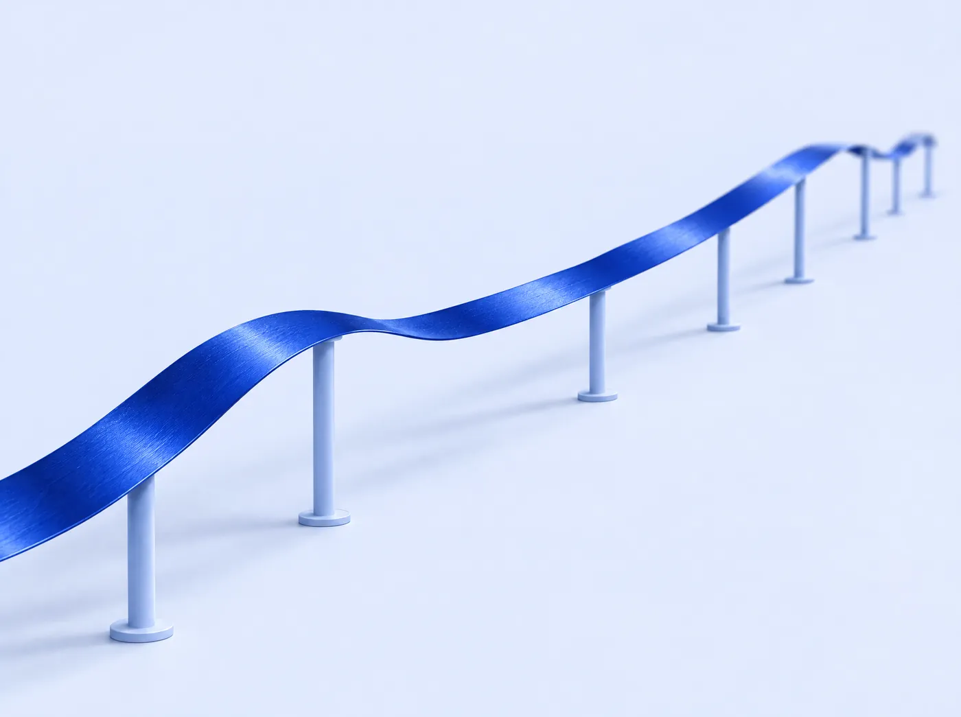 A long cobalt ribbon held up by evenly spaced supports.