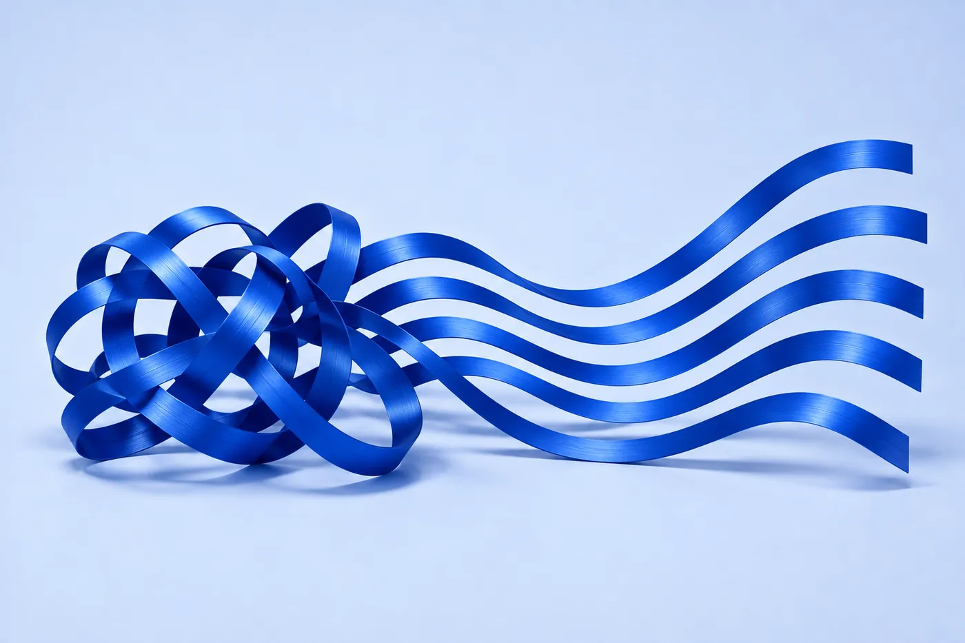 A tangle of cobalt ribbon separating into five smooth parallel paths.