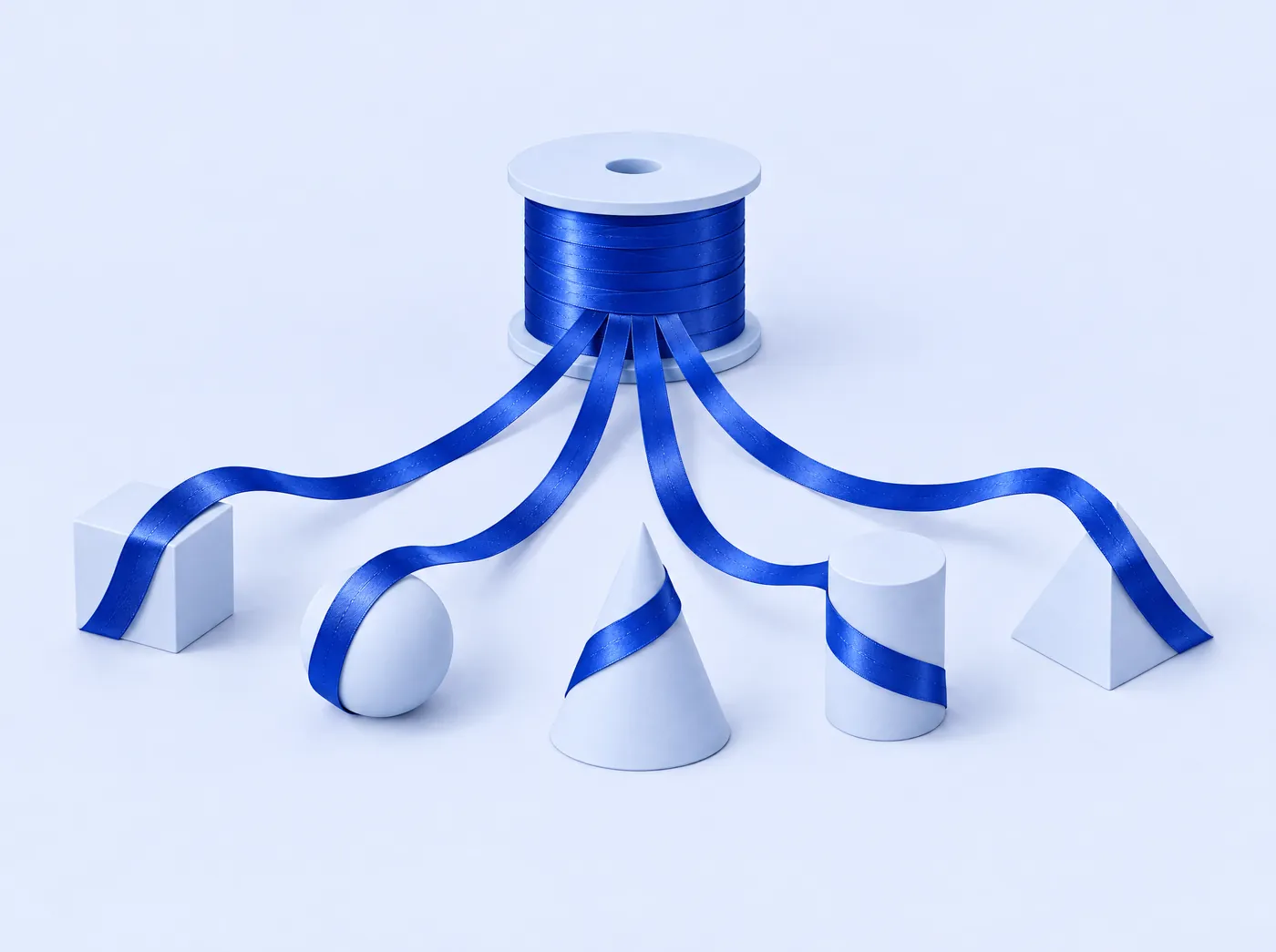 A spool of cobalt ribbon feeding five smaller shapes.